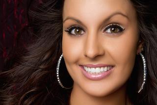 Woman smiling at teeth whitening dentist in Rockville, MD