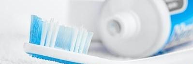 Toothbrush and tooth paste at family dentist Rockville