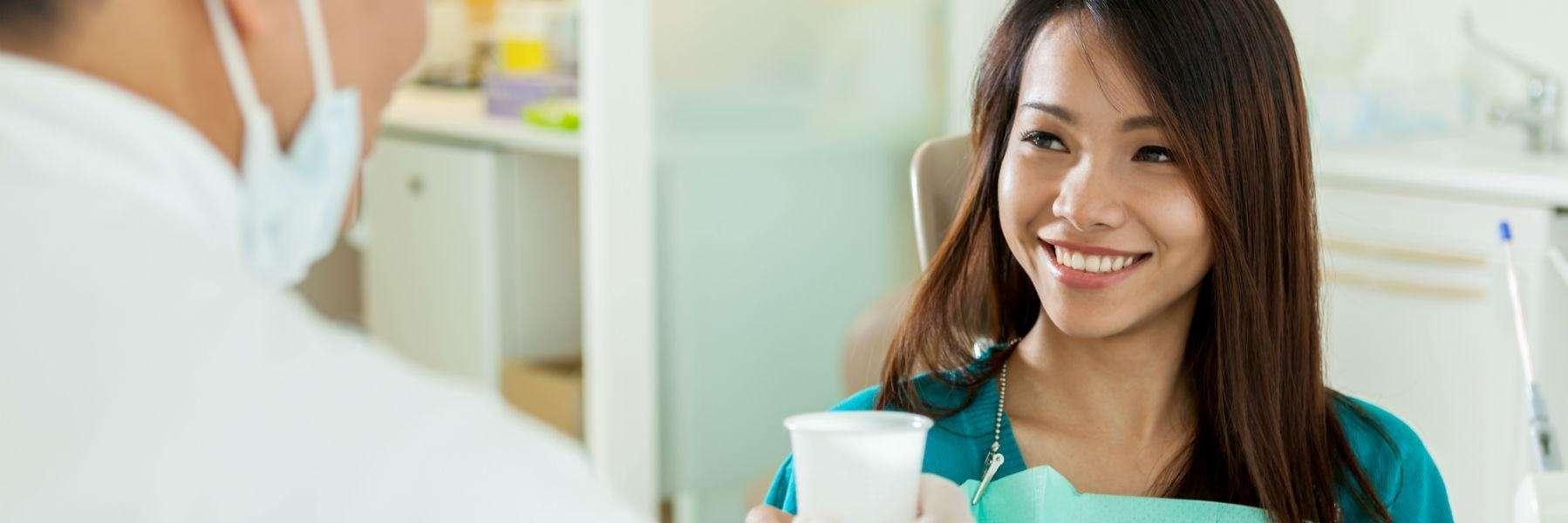 Woman smiling after root canal treatment in Rockville, MD