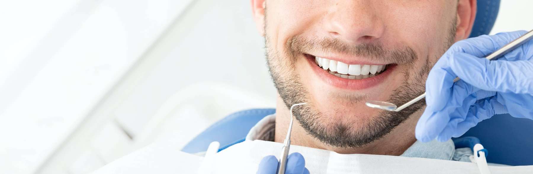 Close up of patient's smile during teeth cleaning at dentist in Rockville, MD