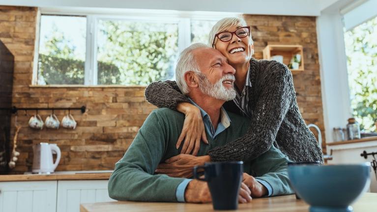 Dental Veneers Patients Embracing and laughing in Rockville, MD