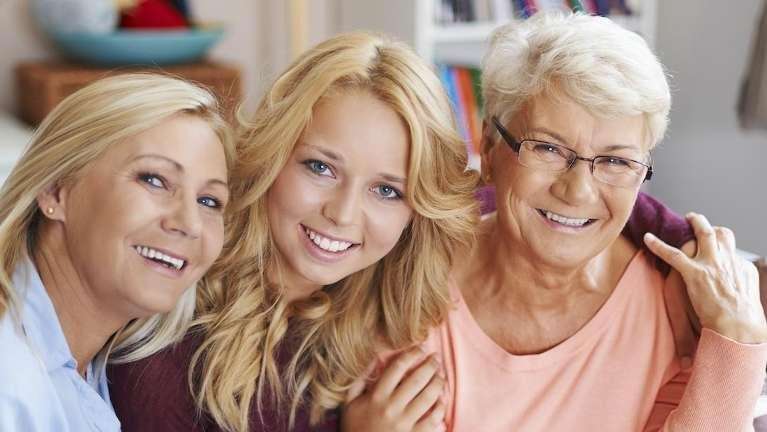 family hugging | opalescence teeth whitening rockville md