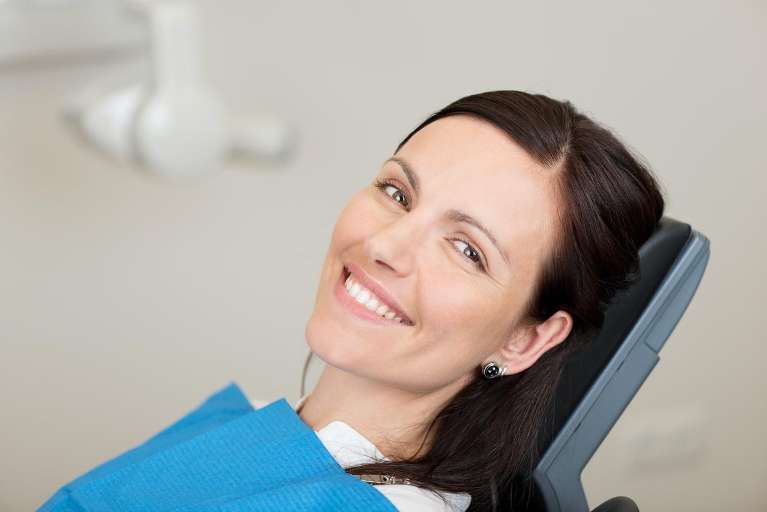 emergency dentist rockville | woman at dentist