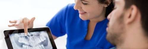 dentist showing digital x-ray | dentist rockville md