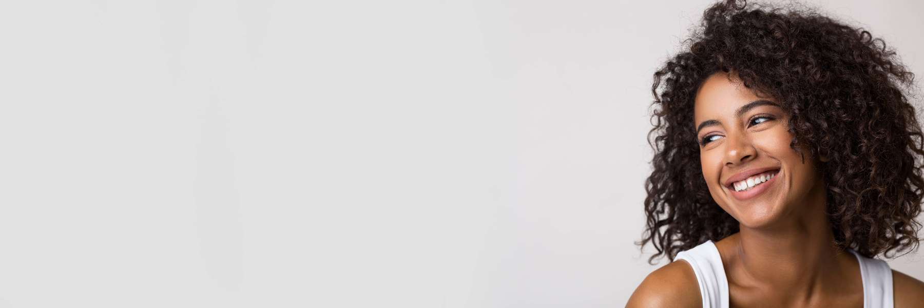 Woman smiling at cosmetic dentist near me Rockville