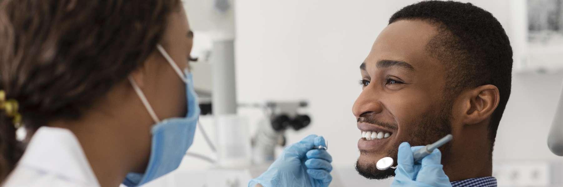 Patient getting dental exam at dentist in Rockville
