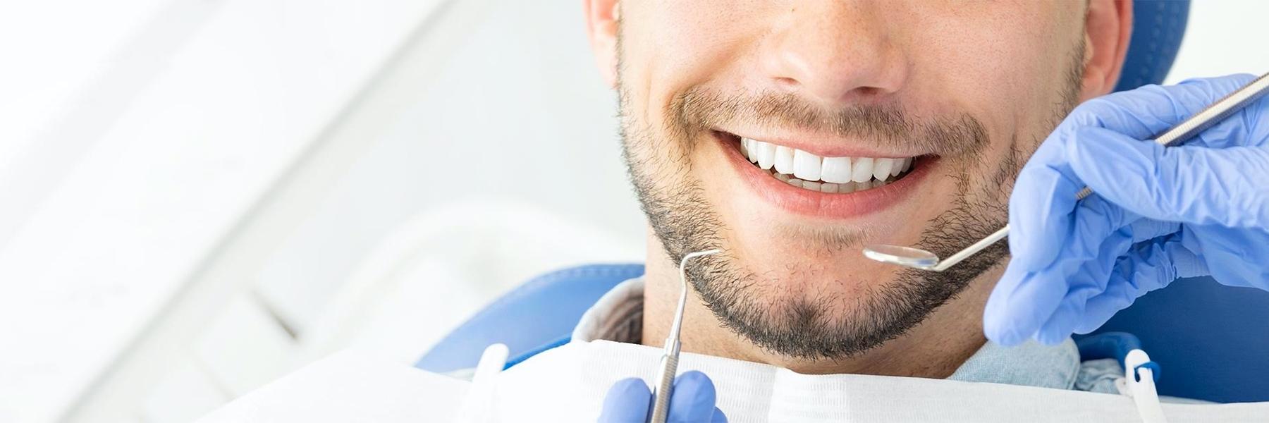 emergency dentist Rockville MD | man at dentist