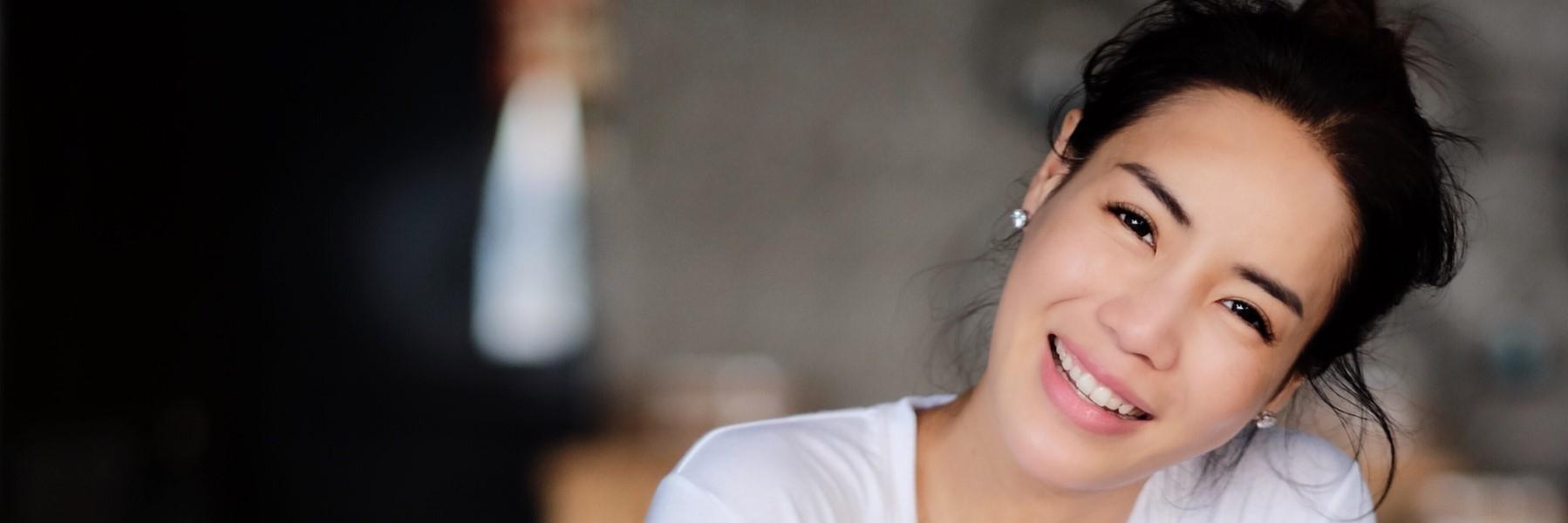 Patient with tooth fillings smiling at dentist in Rockville, MD